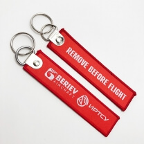 Custom remove before flight logo woven keychain