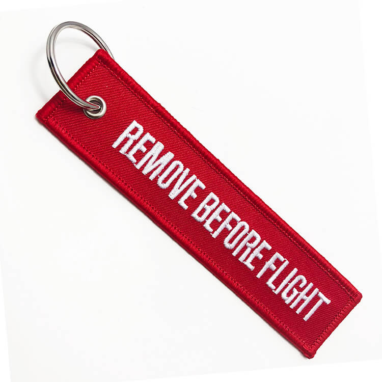 Personalize own brand logo name red remove before flight tag