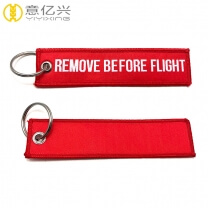 Beautiful polyester printed woven remove before flight ribbon keychain 