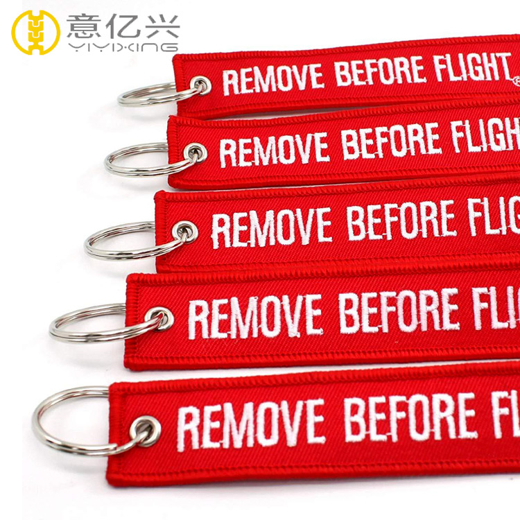 cloth remove before flight streamer keychain