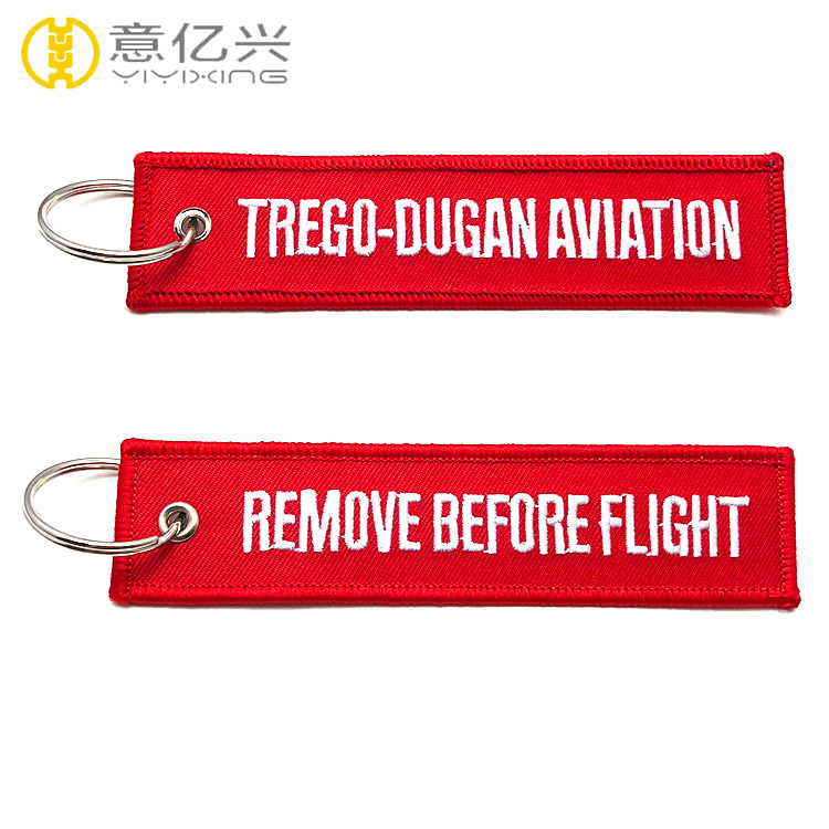 remove before flight tag keychains