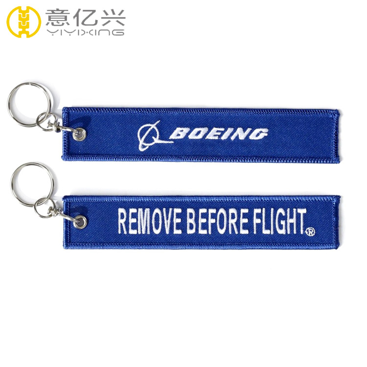 remove before flight keychain blue