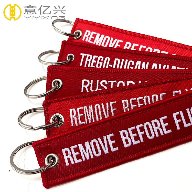 cloth remove before flight streamer keychain