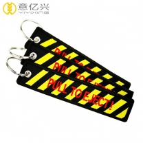 Hot sell quality fabric embroidery pull to eject keychain