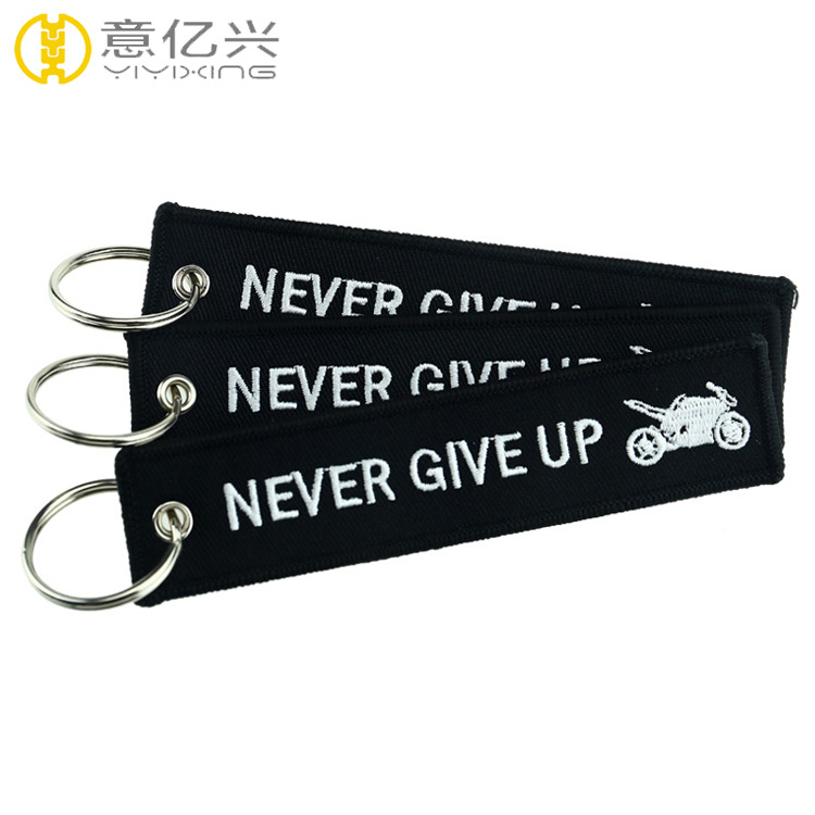 personalized remove before flight keychain