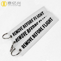 Custom new style branded embroidery logos flight tag keychain