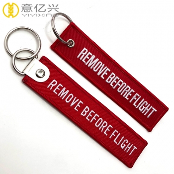 High quality wholesale red boeing remove before flight keychain