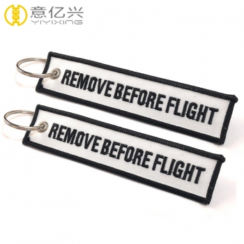 cloth remove before flight streamer keychain