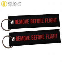 Double side logo woven remove before flight keychain custom
