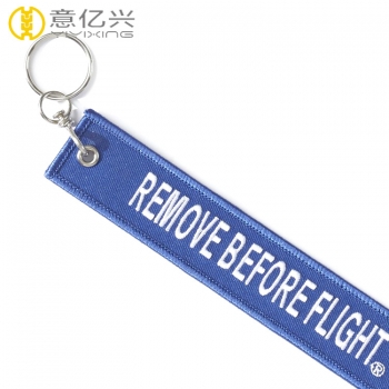 remove before flight keychain blue
