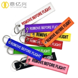 promotional fabric or polyester woven remove before flight key chain