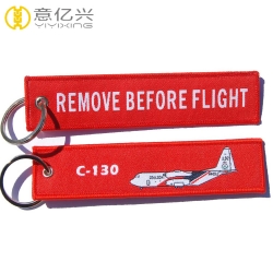Custom flight woven keychain red remove before flight tag with logo