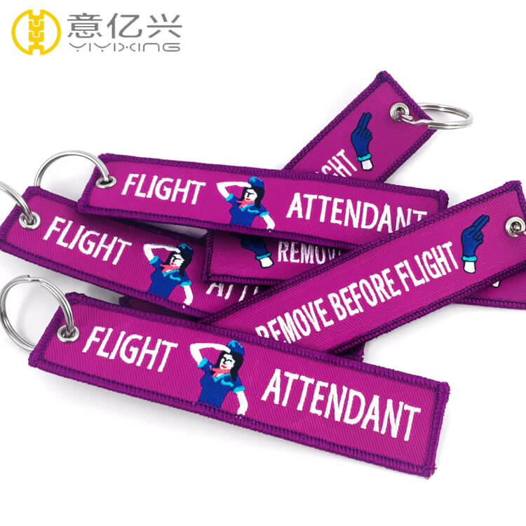 personalized remove before flight keychain