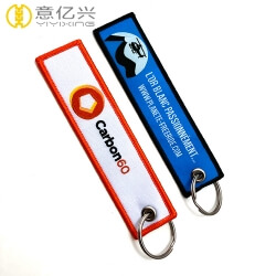 Promotional fabric or polyester woven pull to eject keychain