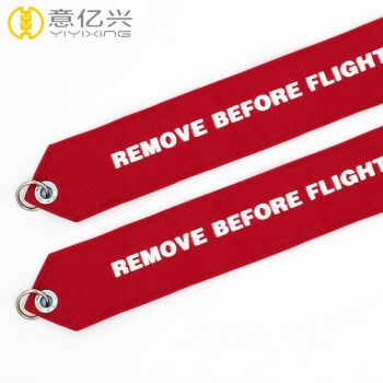 red remove before flight tag