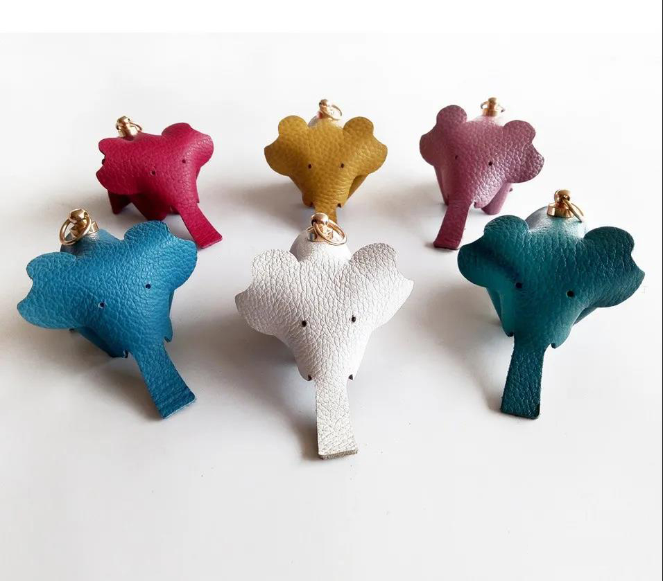 Handmade a piece of leather DIY cute elephant keychain pendant